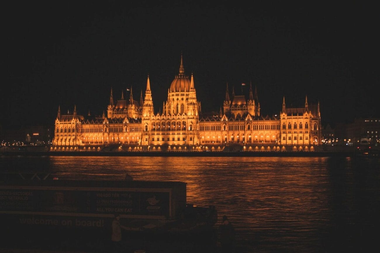 majestic palace building glowing at night - Hungarian parliament