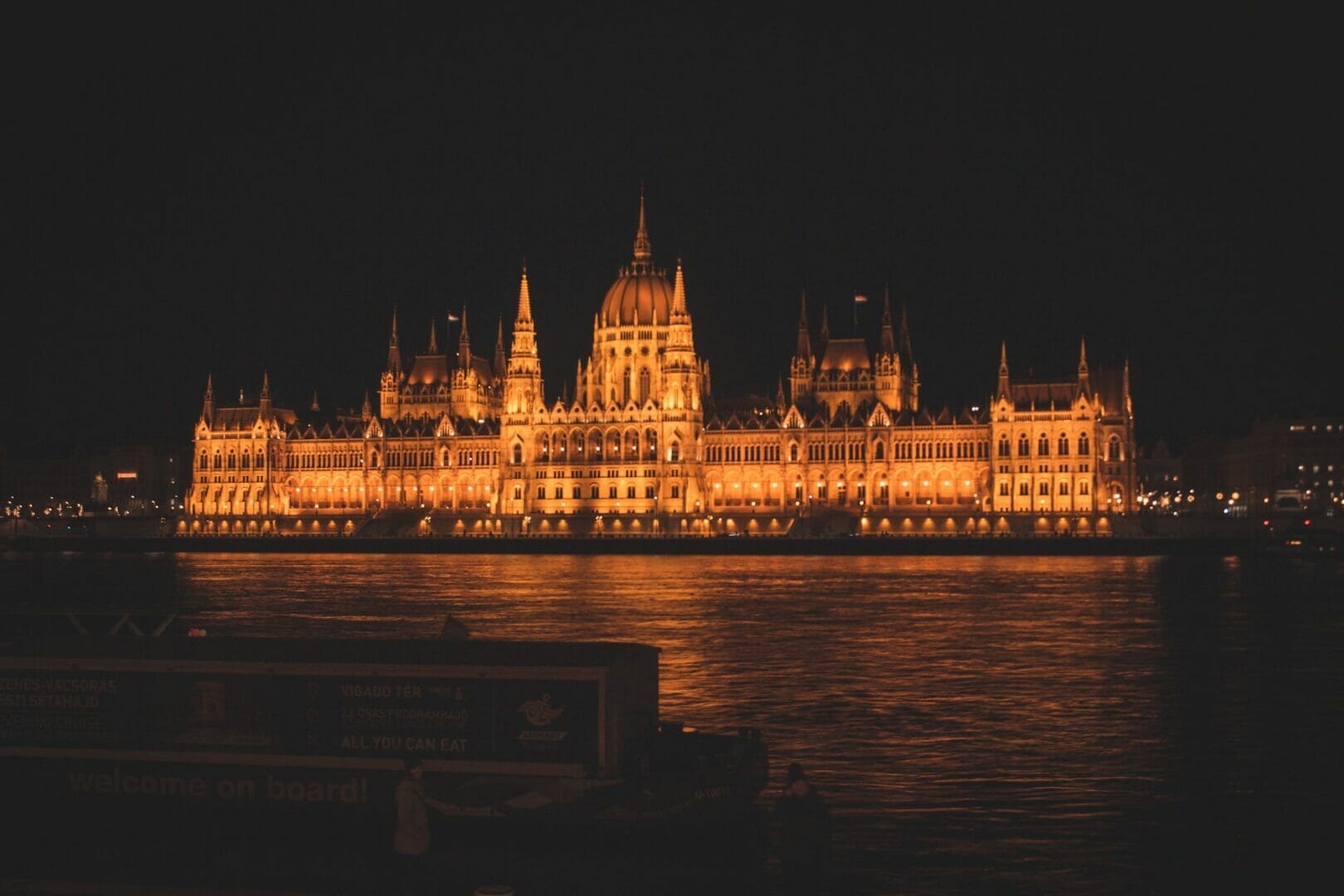 majestic palace building glowing at night - Hungarian parliament