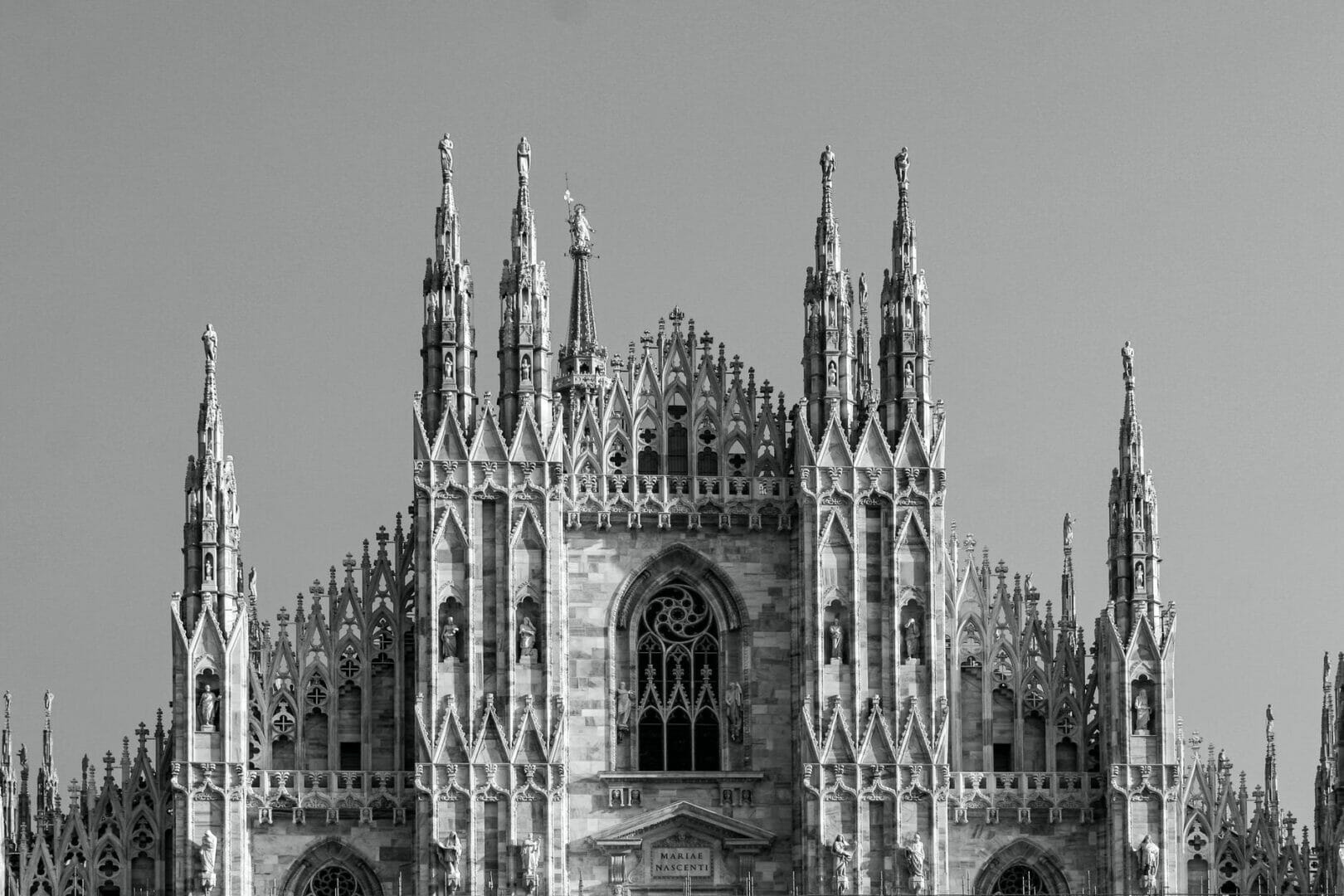 grayscale photography of cathedral - Top Things to do in Milan Italy 