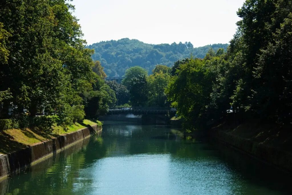 A picturesque canal lined with trees, offering a tranquil experience in Ljubljana, Slovenia. - Things to do in Ljubljana Slovenia