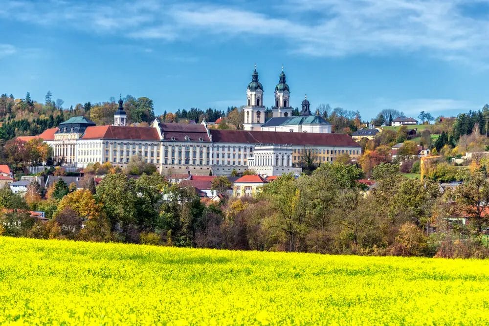 St. Florian Monastery: A castle in a yellow field.