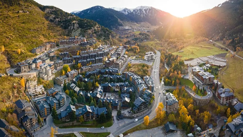 Drone Laws in Andorra - An aerial view of a town in the mountains captured by a 