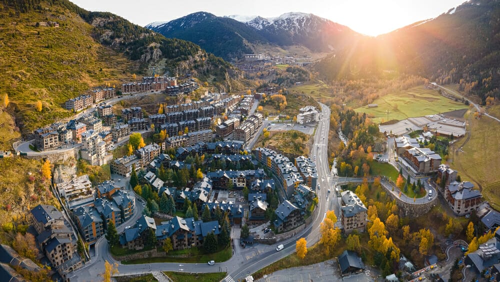 Drone Laws in Andorra - An aerial view of a town in the mountains captured by a 