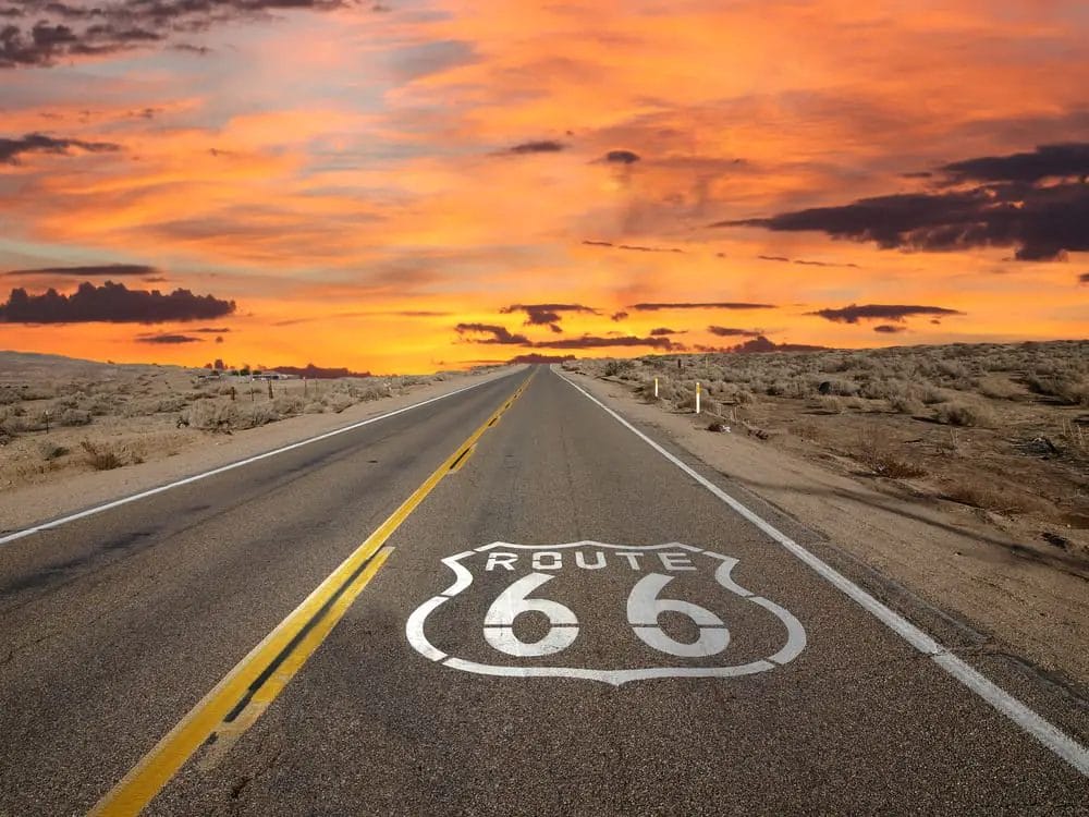 Route 66 sign on a road.