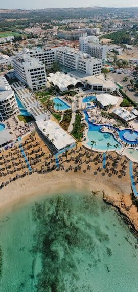 An aerial view of a beach resort in cyprus.