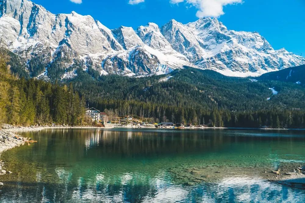 Eibsee, a picturesque lake surrounded by mountains and trees in Germany.