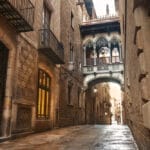 A picturesque narrow alley in the vibrant city of Barcelona, perfect for Instagram captions.