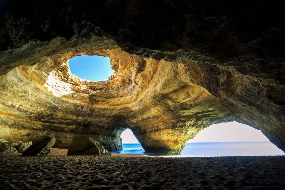 The inside of a cave on one of the best sandy beaches in Europe.