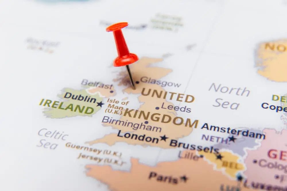 A pin is pinned on a map of united kingdom.